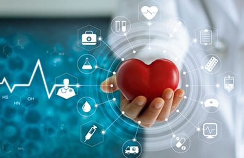 A doctor holding a (not realistic) heart with many metrics stylishly surrounding it.